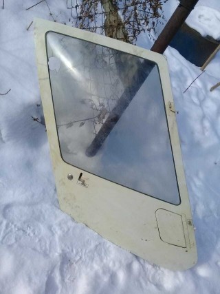 Front door for a helicopter Robinson P44