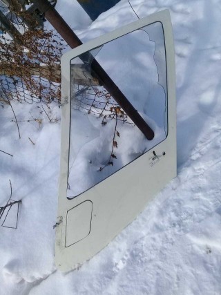 Front door for a helicopter Robinson P44