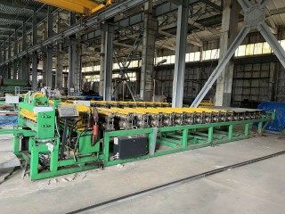 Line for the production of corrugated sheets and metal tiles